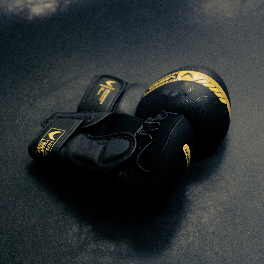 VERO Counter-Series MMA sparring gloves in black and yellow — 8oz cowhide leather